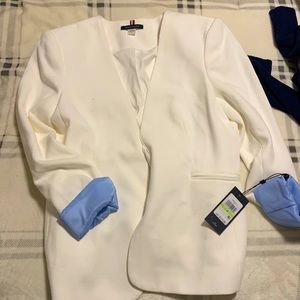 perfect condition coat, blue cuffs, white texture, satin lining